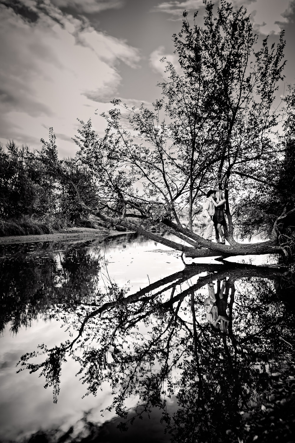 Billings-Montana-fall-engagement-couple-reflection-off-pond-black-and-white.jpg