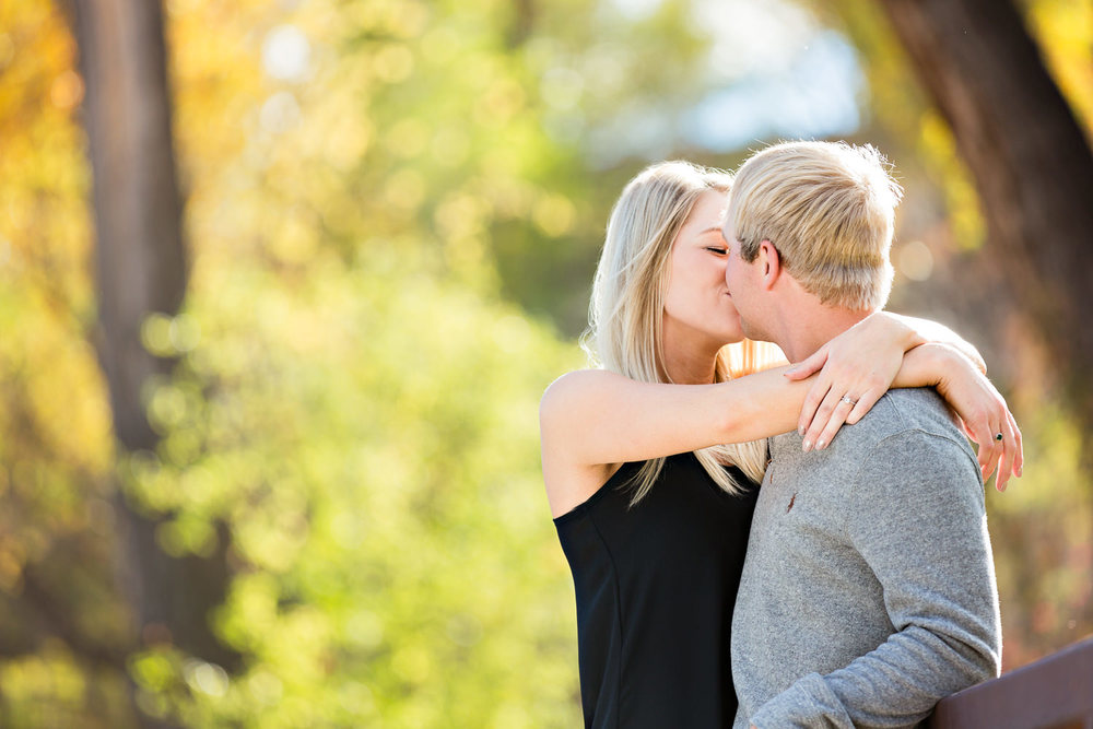 Billings-Montana-fall-engagement-kissing-in-colorful-park.jpg