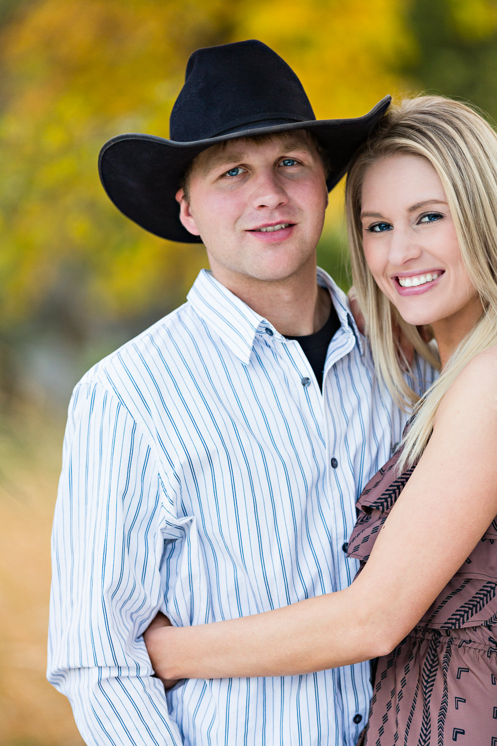 Billings-Montana-fall-engagement-man-with-cowboy-hat-and-his-lady.jpg
