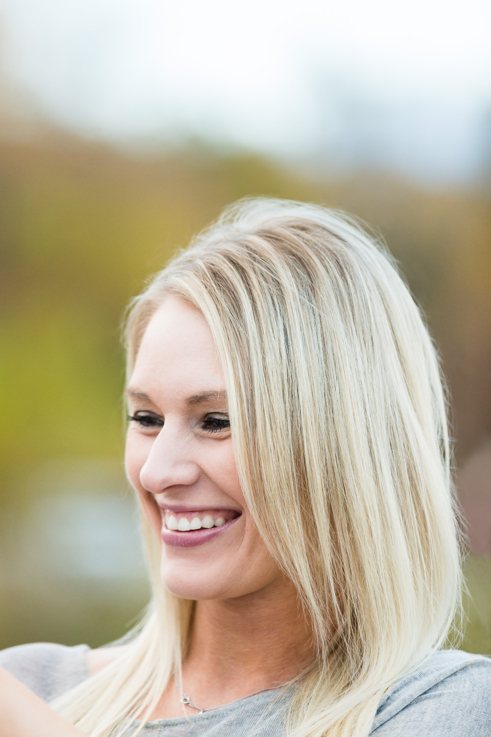 Billings-Montana-fall-engagement-woman-laughing.jpg