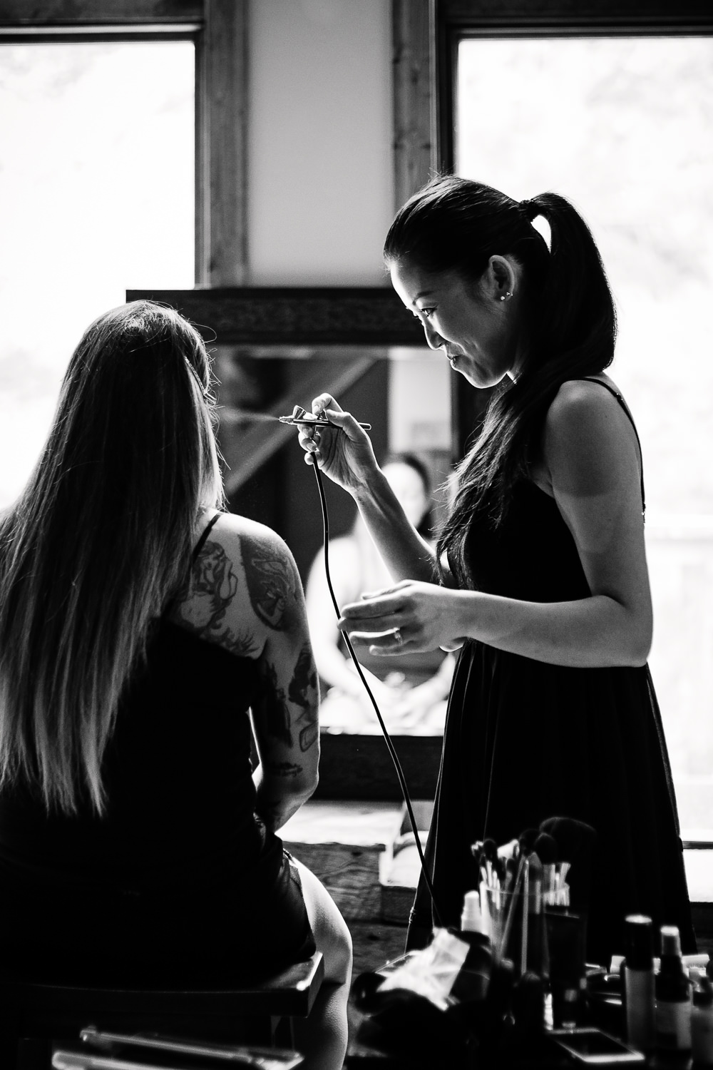 bozeman-hart-ranch-wedding-bride-air-brushing.jpg