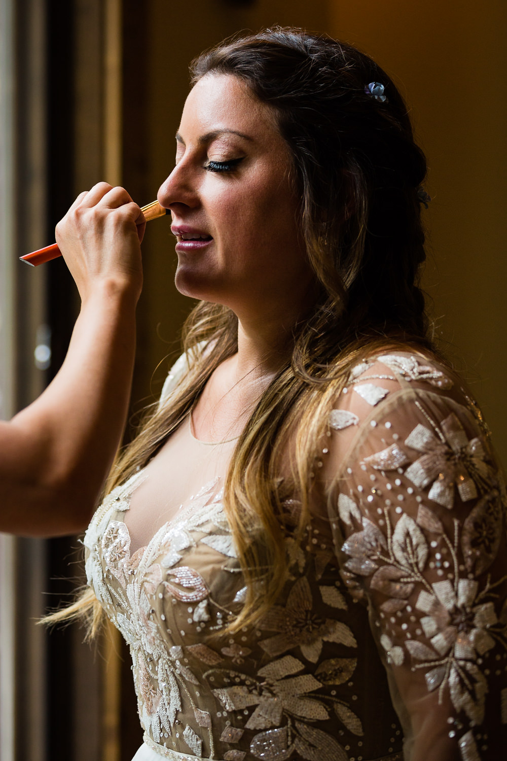 bozeman-hart-ranch-wedding-bride-does-final-makeup-check.jpg