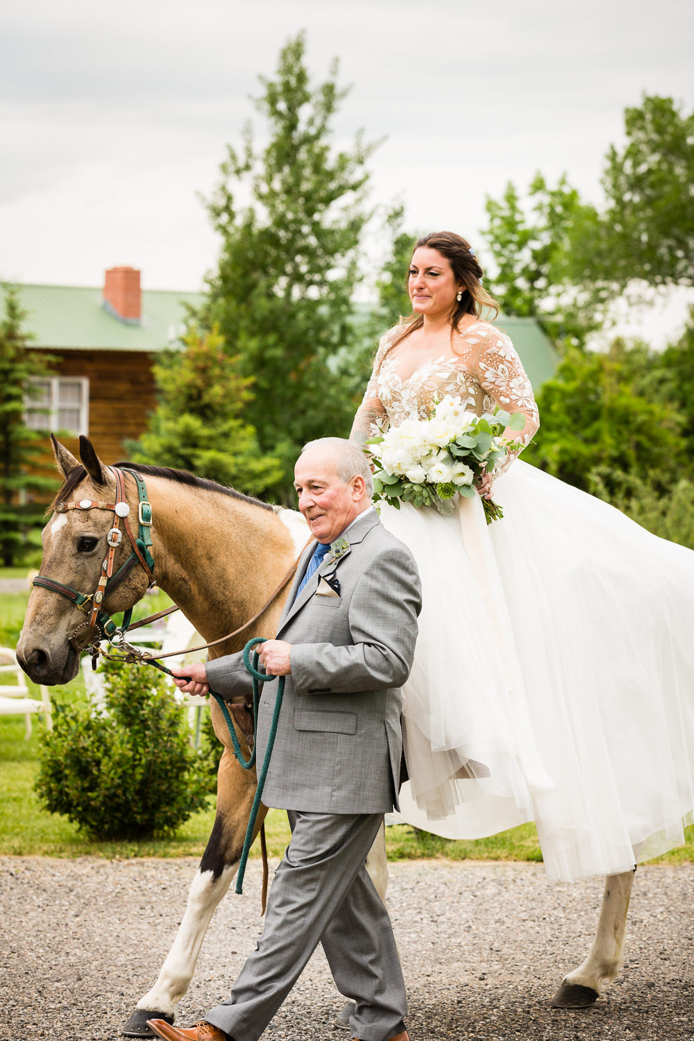 bozeman-hart-ranch-wedding-bride-enters-on-horse.jpg