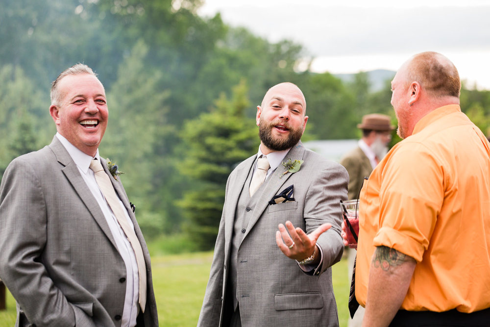 bozeman-hart-ranch-wedding-groom-laughing-with-friends.jpg