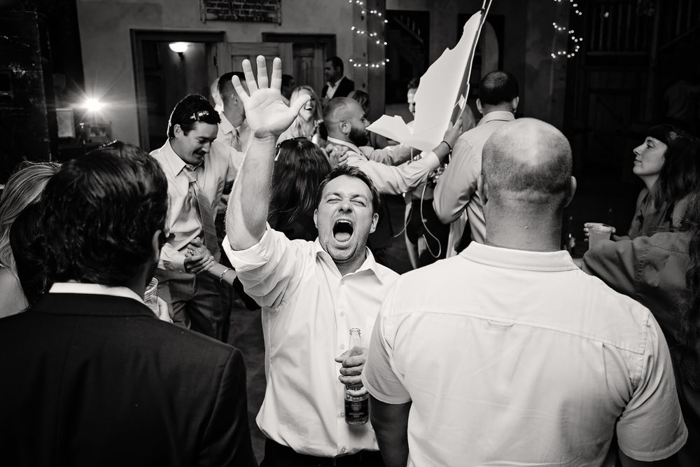 bozeman-hart-ranch-wedding-guest-dances-at-reception.jpg