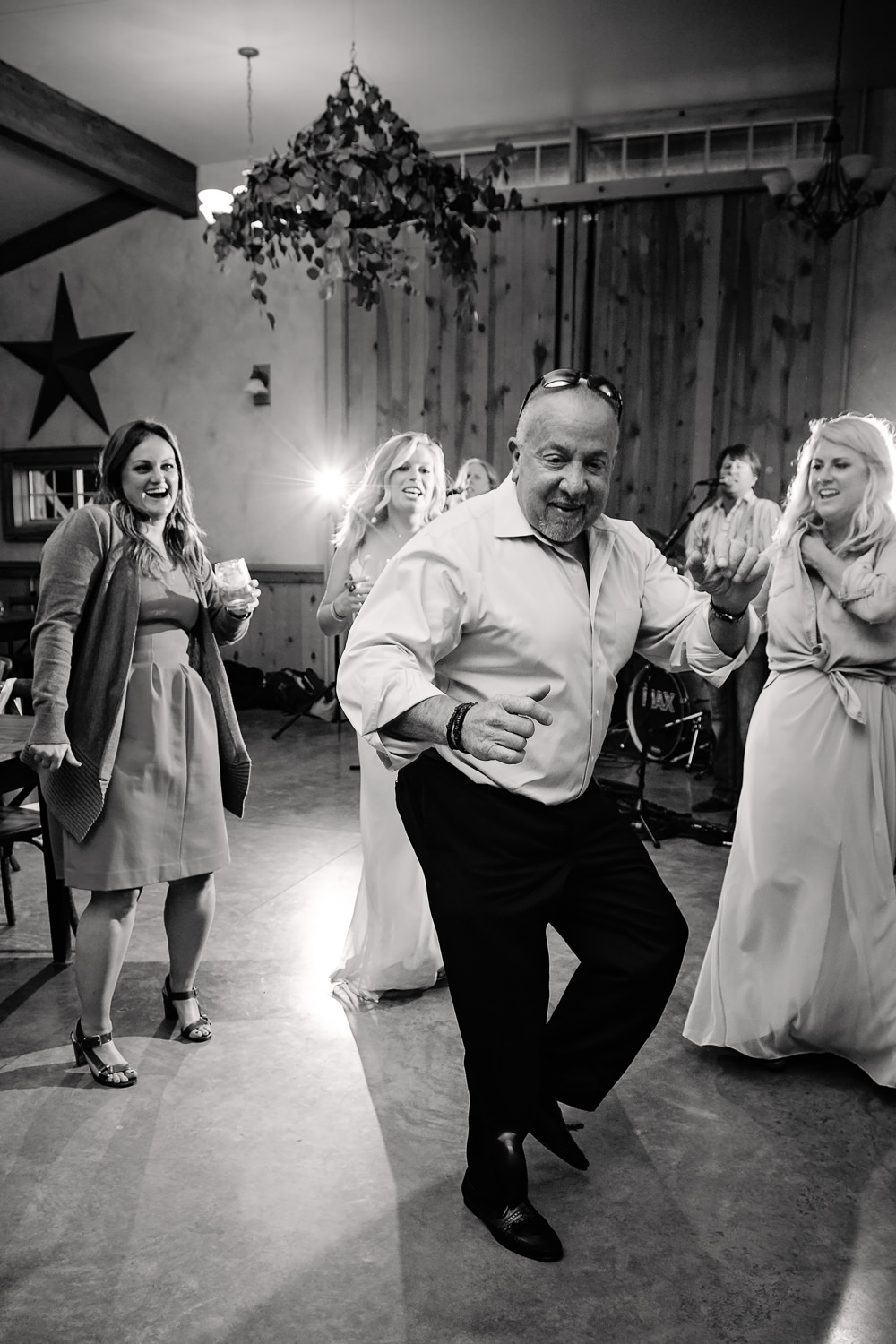 bozeman-hart-ranch-wedding-older-male-guest-dancing.jpg