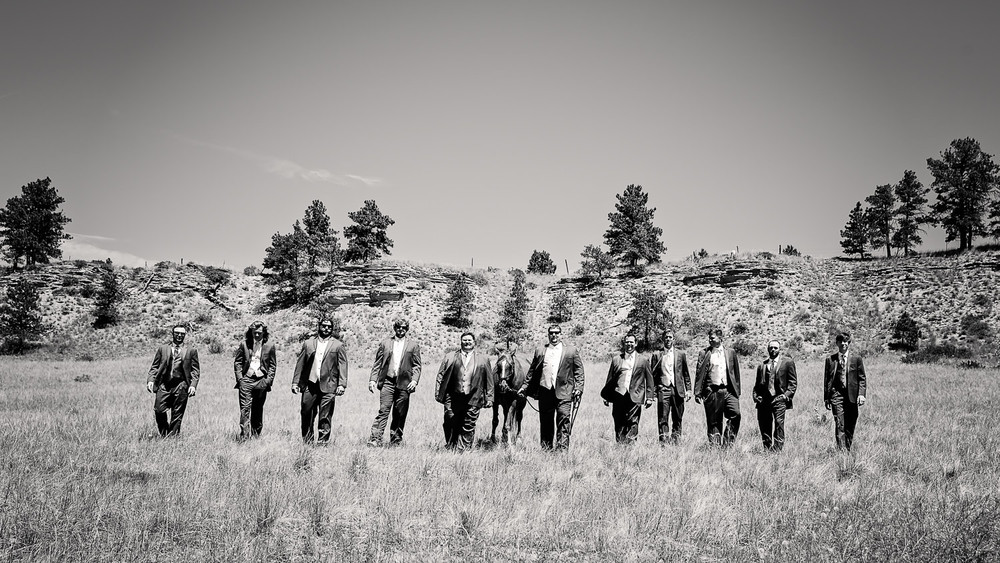 billings-montana-swift-river-ranch-wedding-groom-groomsmen-horse.jpg