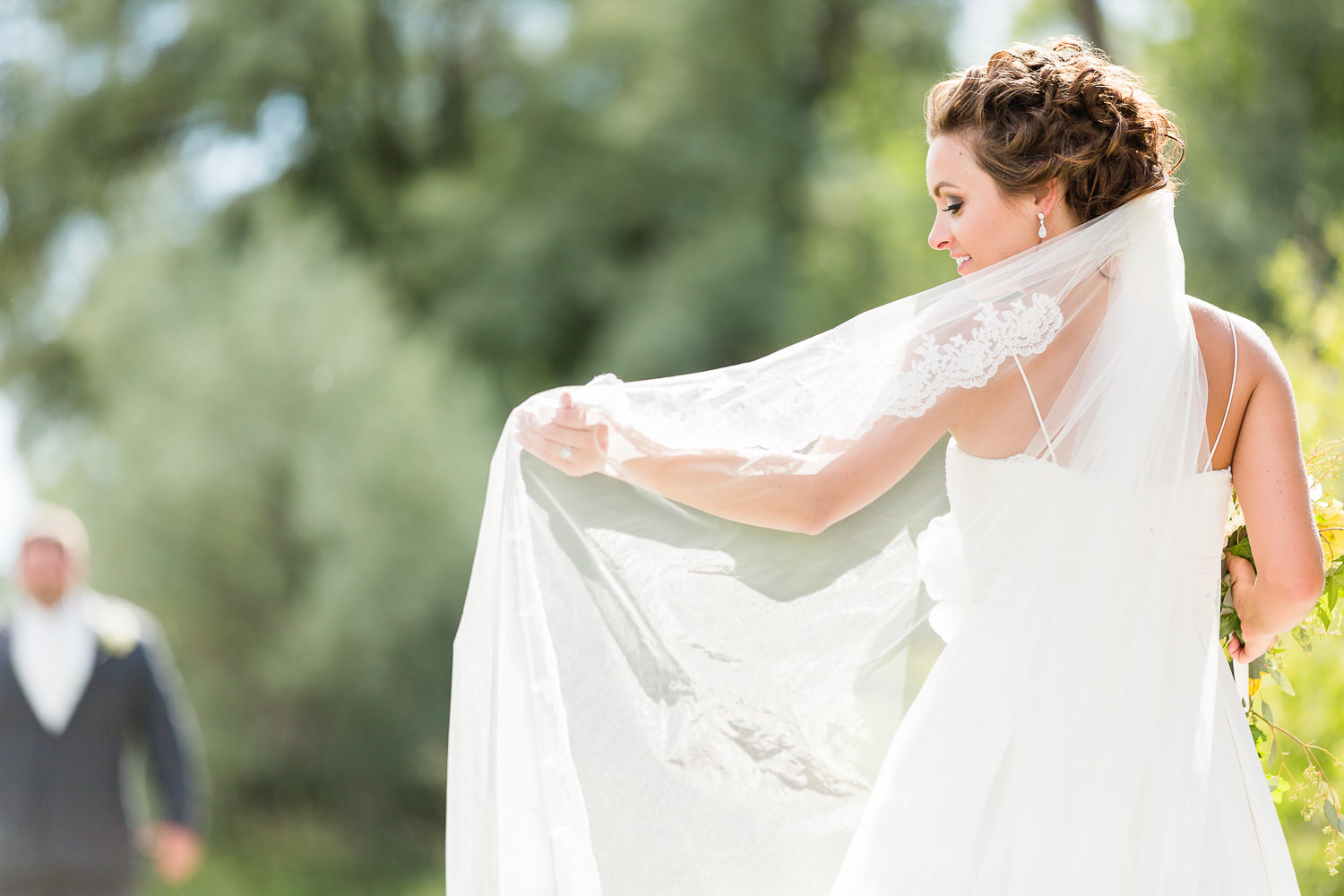 billings-montana-swift-river-ranch-wedding-bride-with-her-veil.jpg