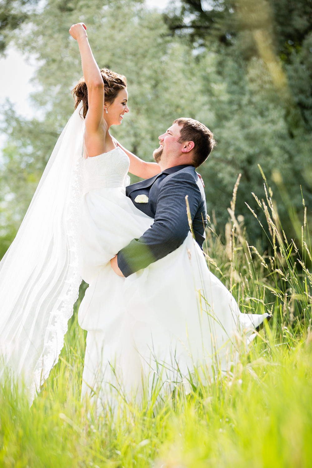 billings-montana-swift-river-ranch-wedding-reception-playful-couple-photo.jpg