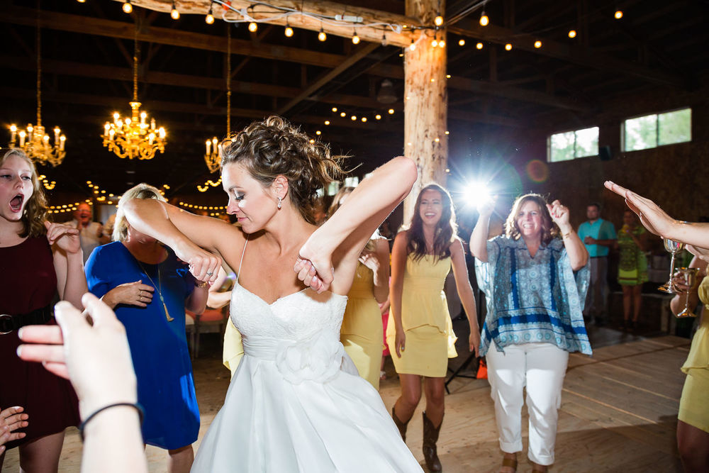 billings-montana-swift-river-ranch-wedding-reception-bride-dancing.jpg