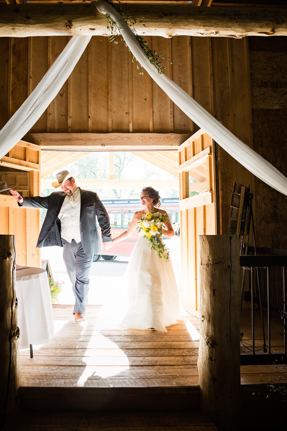 billings-montana-swift-river-ranch-wedding-reception-bride-groom-entry.jpg