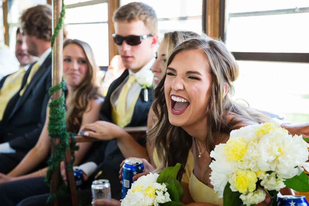 billings-montana-swift-river-ranch-wedding-reception-bridesmaid-laughing-tipsy-trolley.jpg