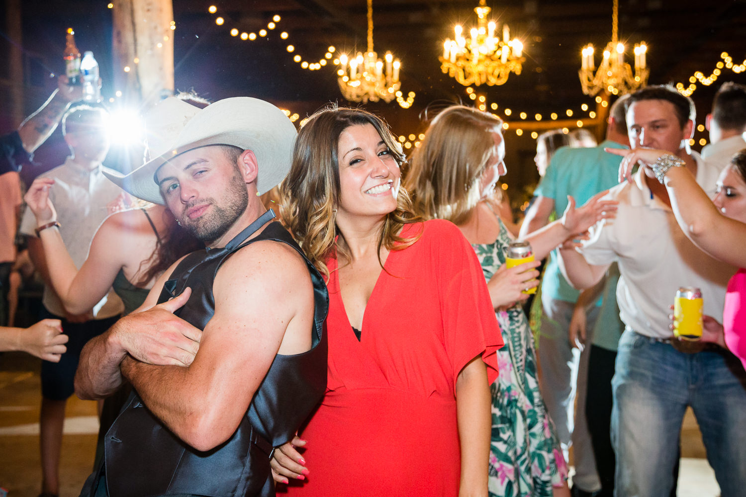 billings-montana-swift-river-ranch-wedding-reception-groomsmen-dances-with-girl.jpg