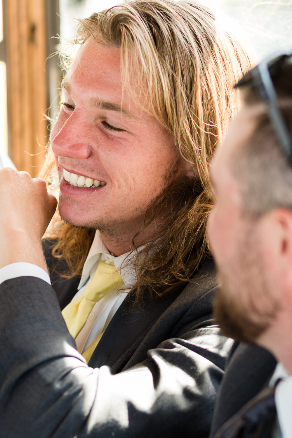 billings-montana-swift-river-ranch-wedding-reception-groomsmen-on-tipsey-trolley.jpg