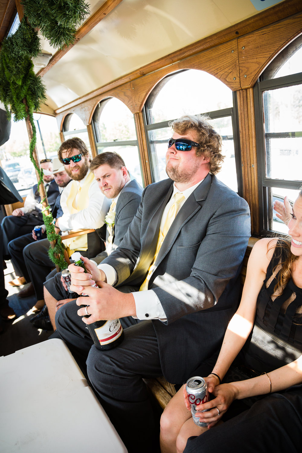 billings-montana-swift-river-ranch-wedding-reception-groomsmen-pops-champagne.jpg