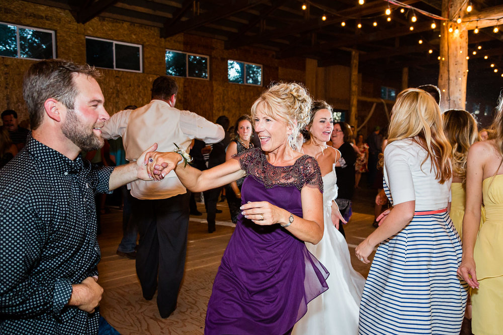 billings-montana-swift-river-ranch-wedding-reception-mother-of-groom-dancing.jpg