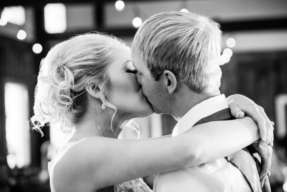 red-lodge-montana-wildflower-wedding-bride-groom-kiss-during-first-dance.jpg