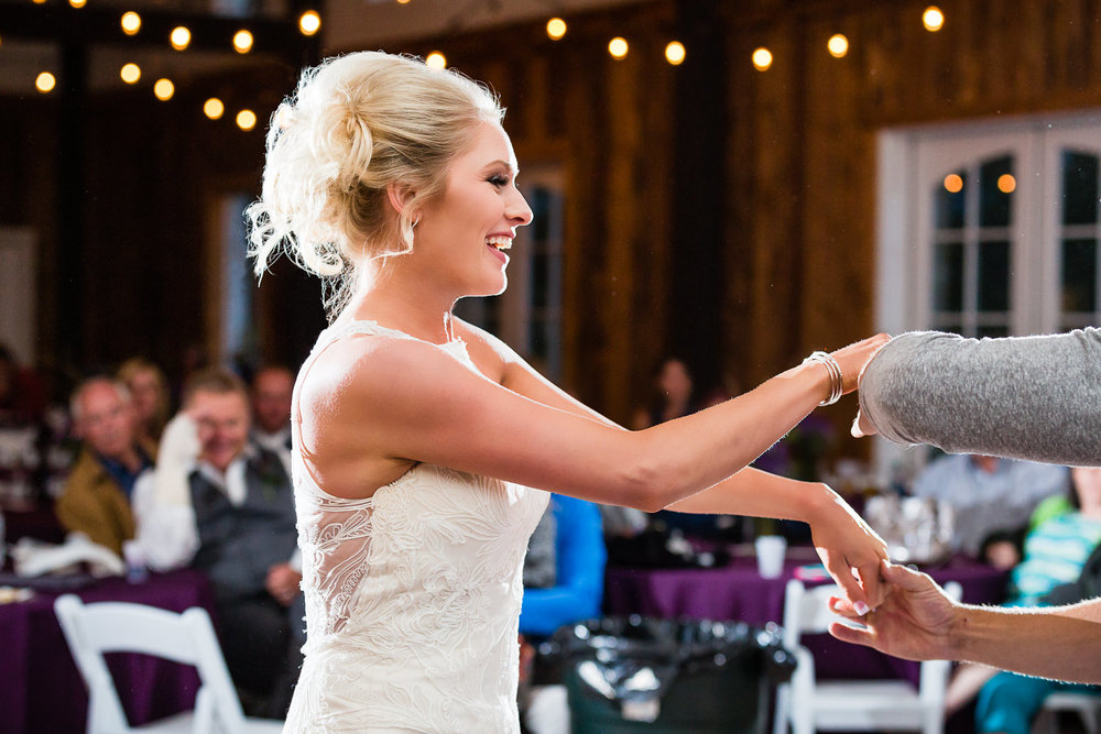 red-lodge-montana-wildflower-wedding-bride-dances-at-reception.jpg
