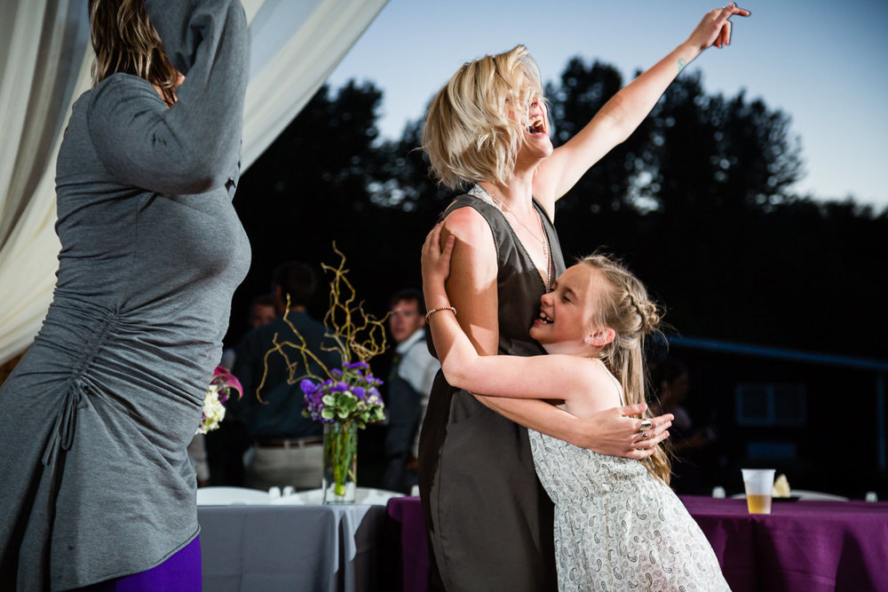 red-lodge-montana-wildflower-wedding-mom-daughter-hug-reception.jpg