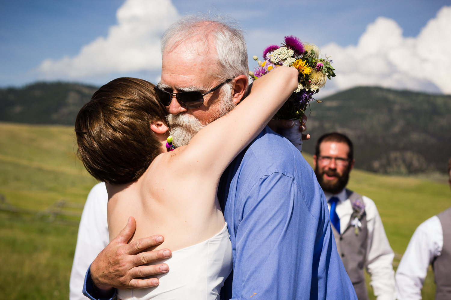 bozeman-montana-wedding-bride-hugs-father-at-altar.jpg