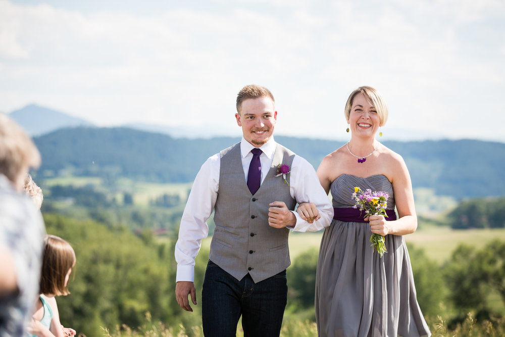 bozeman-montana-wedding-bridesmaid-groomsmen-walk-aisle.jpg