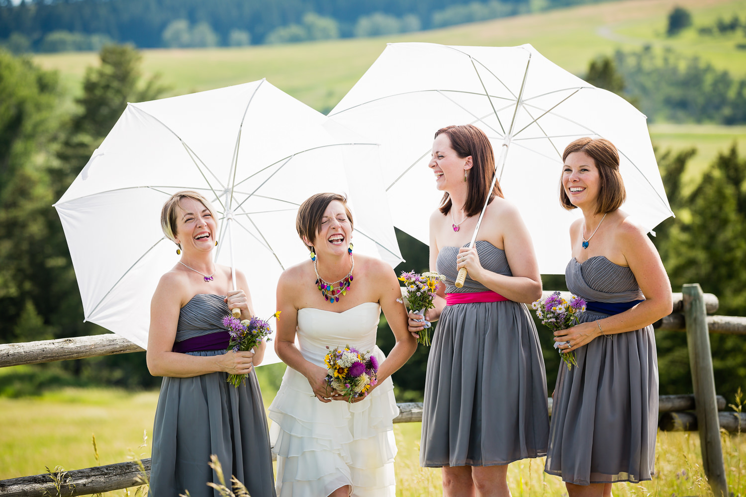 bozeman-montana-wedding-bride-bridesmaids-laughing-before-ceremony.jpg