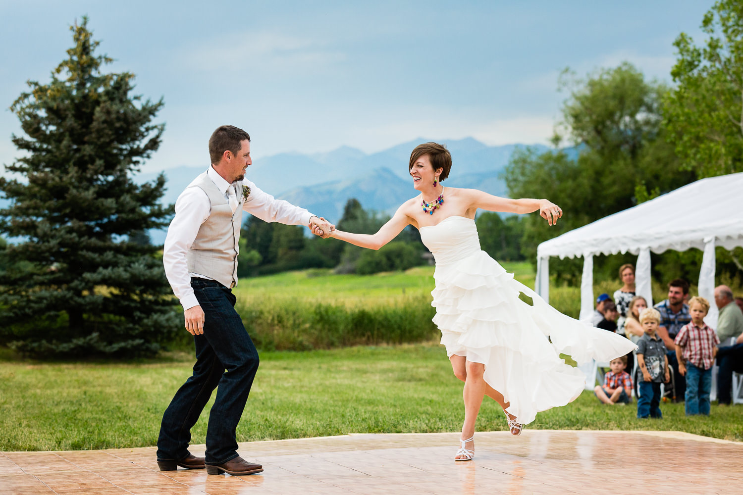 bozeman-montana-wedding-bride-grom-flying-across-dance-floor.jpg
