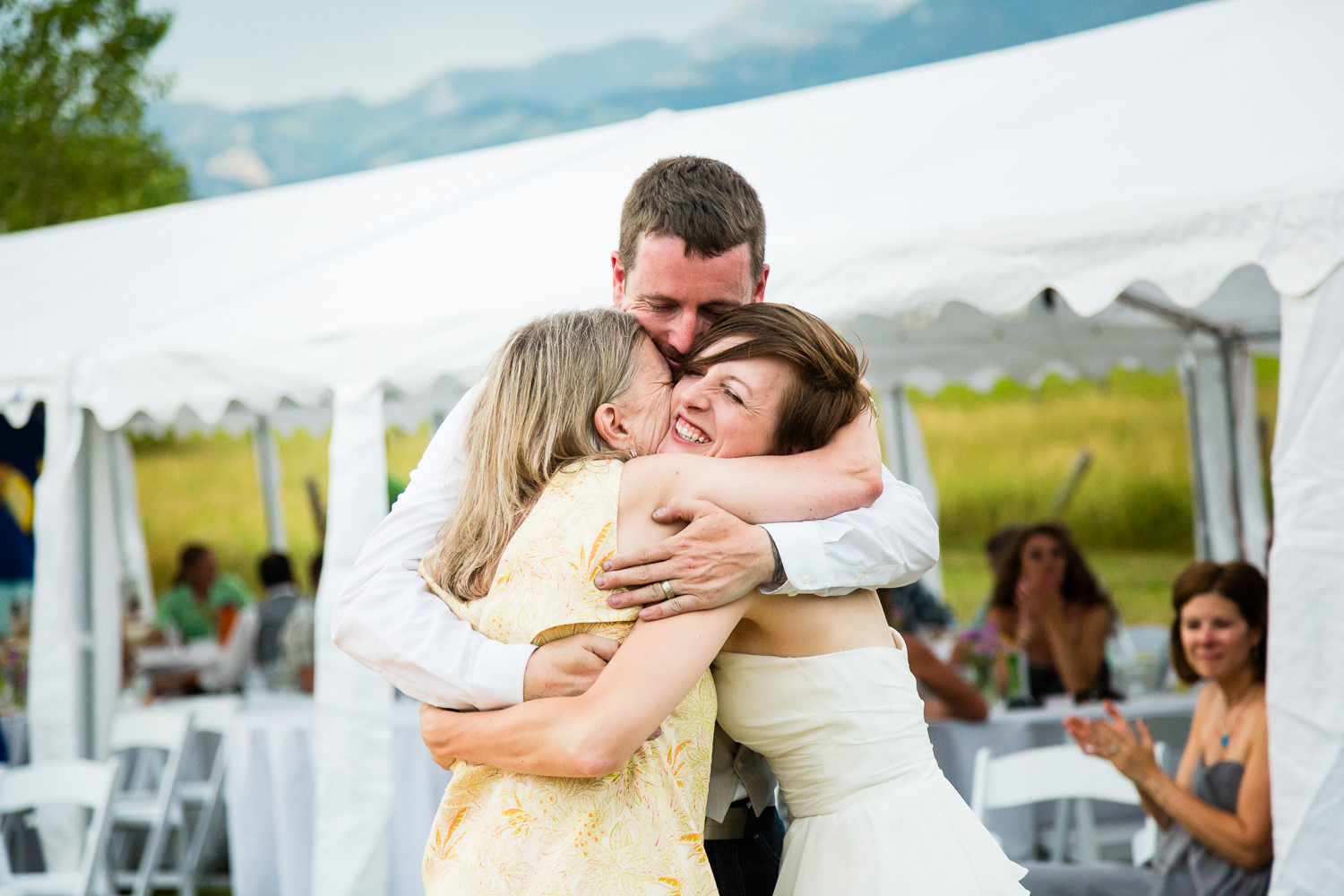 bozeman-montana-wedding-bride-groom-hug-mom.jpg