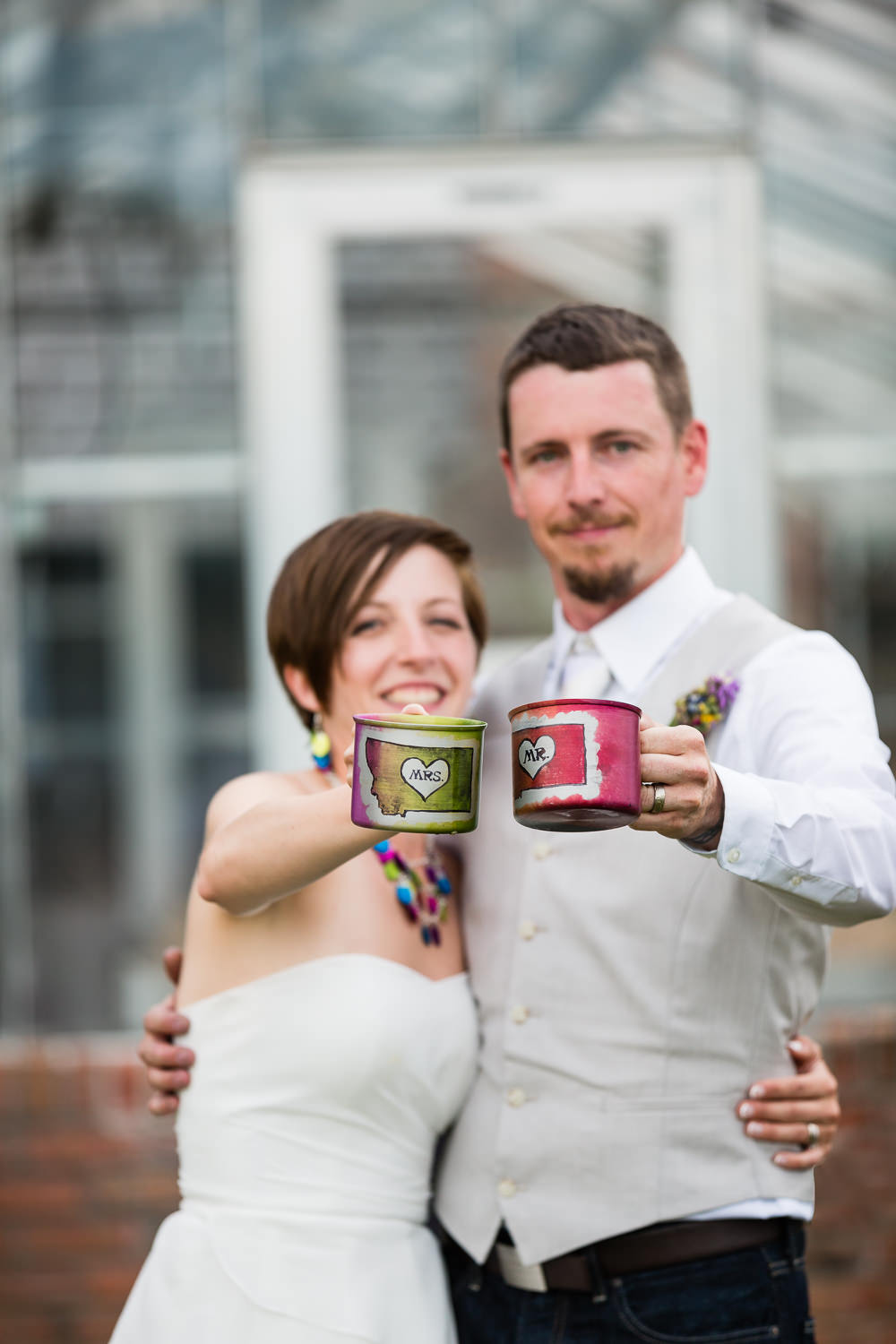 bozeman-montana-wedding-bride-groom-toasting-cups.jpg