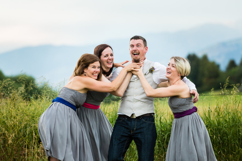 bozeman-montana-wedding-bridesmaids-choke-groom.jpg