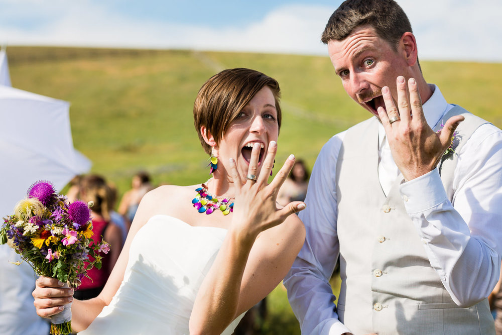 bozeman-montana-wedding-bride-groom-showoff-rings.jpg