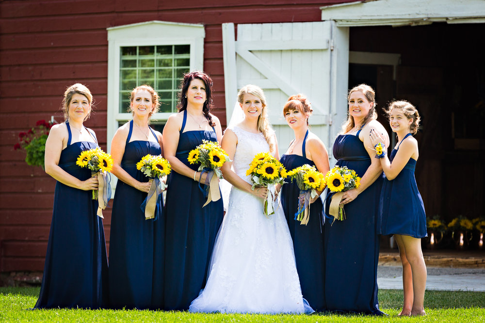 bozeman-montana-wedding-roys-barn-bride-bridesmaids-by-barn.jpg