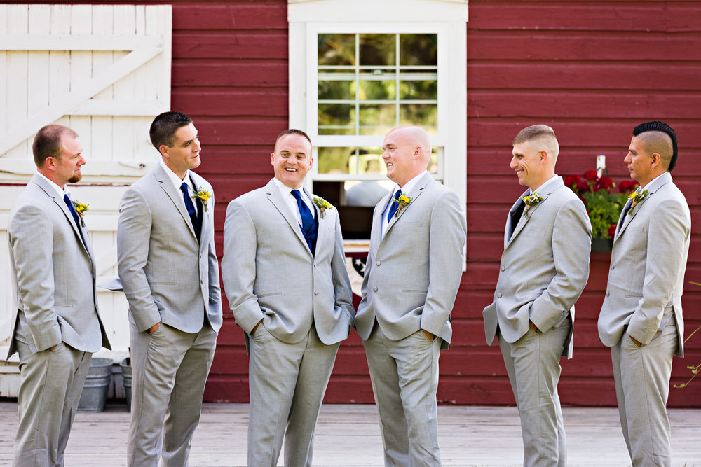 bozeman-montana-wedding-roys-barn-groom-groomsmen-by-barn.jpg