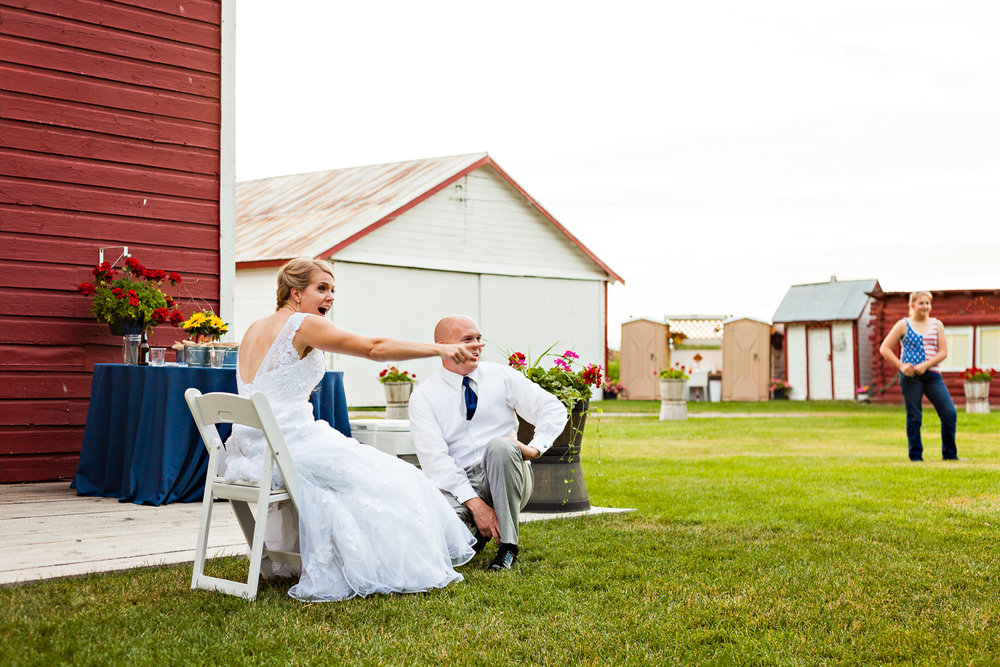 bozeman-montana-wedding-roys-barn-bride-during-garter-toss.jpg