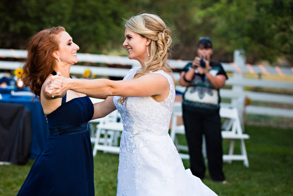 bozeman-montana-wedding-roys-barn-bride-friend-dance.jpg