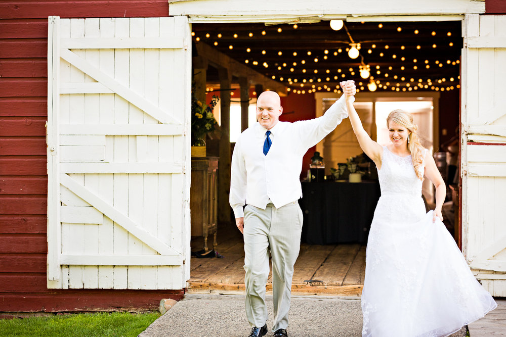 bozeman-montana-wedding-roys-barn-bride-groom-enter-reception.jpg