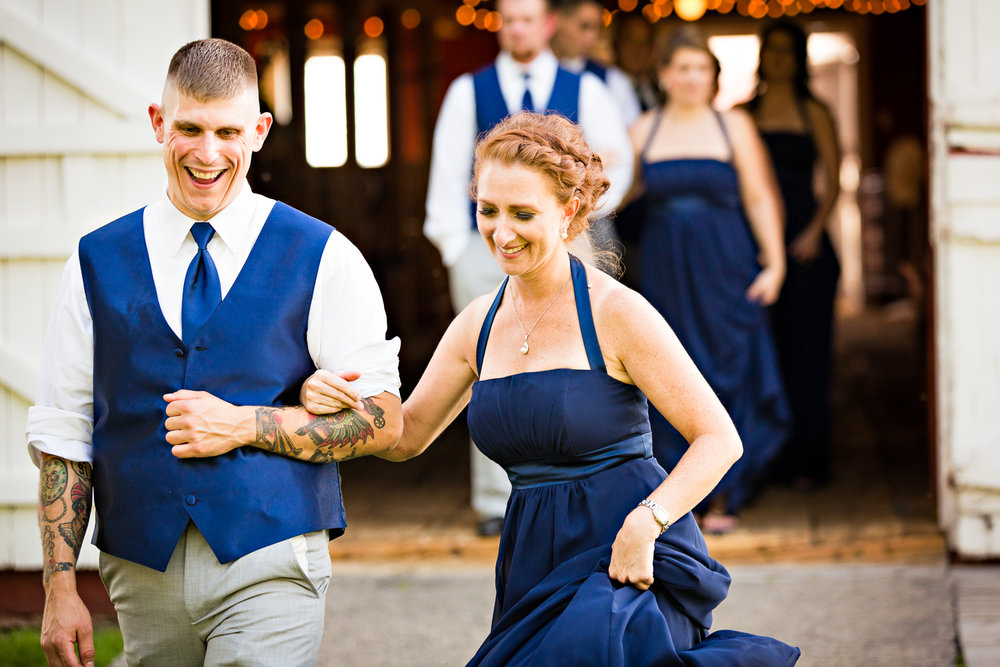 bozeman-montana-wedding-roys-barn-bridesmaid-groomsmen-skip-to-reception.jpg