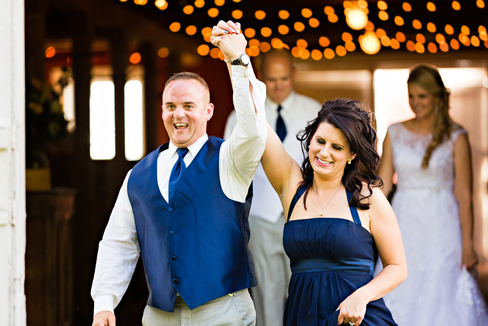 bozeman-montana-wedding-roys-barn-maid-honor-and-best-man-enter-reception.jpg