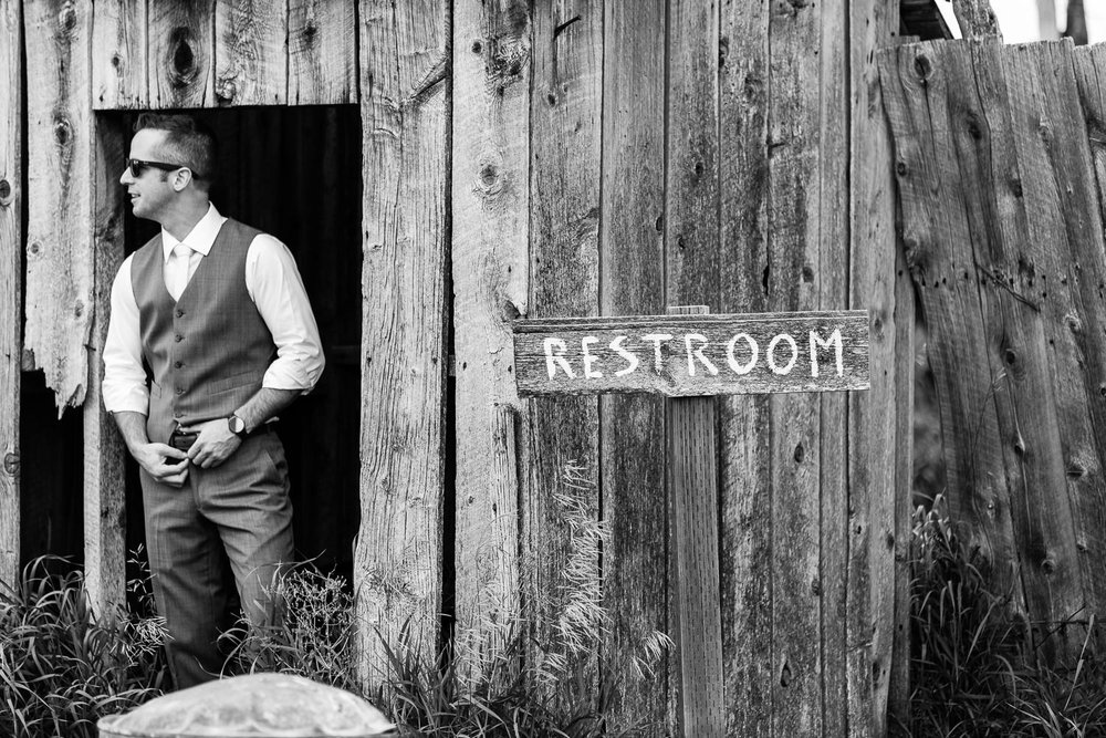 bozeman-wedding-big-yellow-barn-groom-restroom.jpg