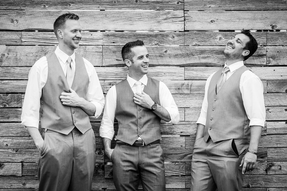 bozeman-wedding-big-yellow-barn-groomsmen-groom-laughs.jpg