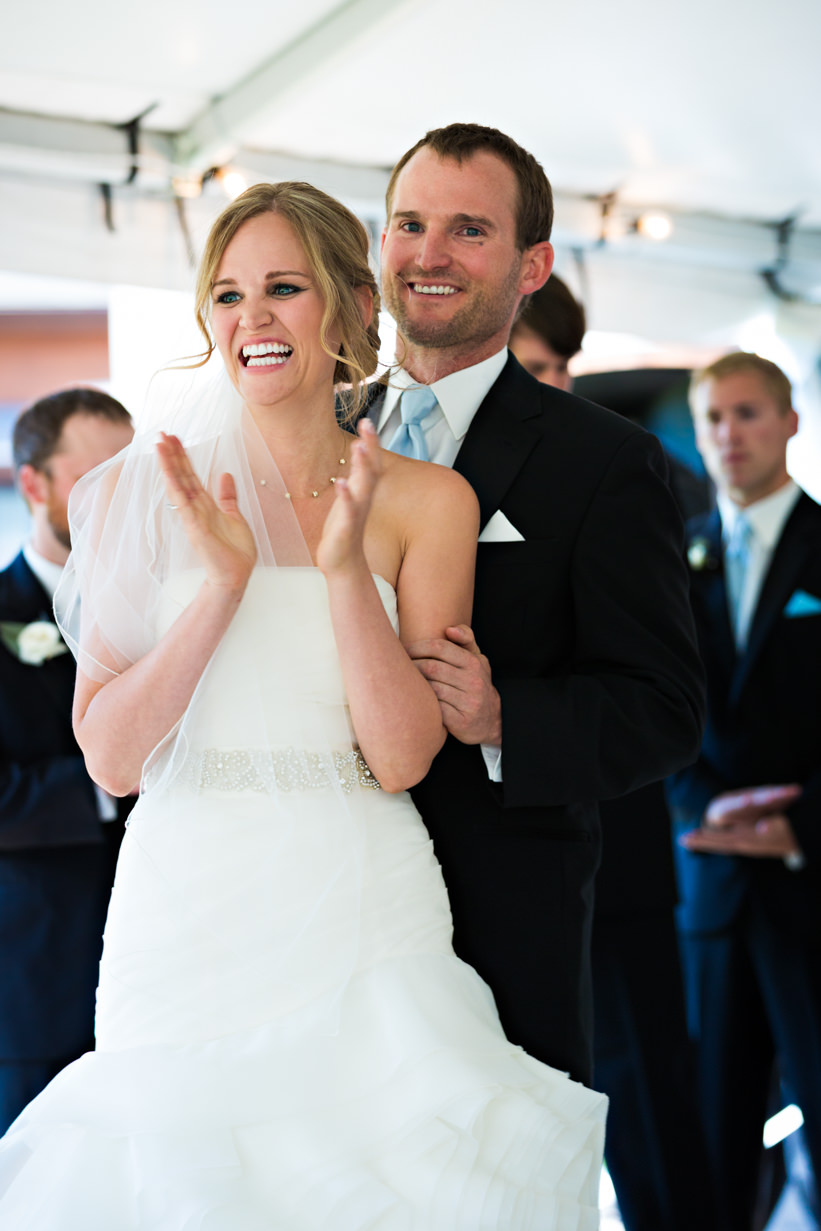 big-sky-resort-wedding-bride-claps-during-ceremony.jpg