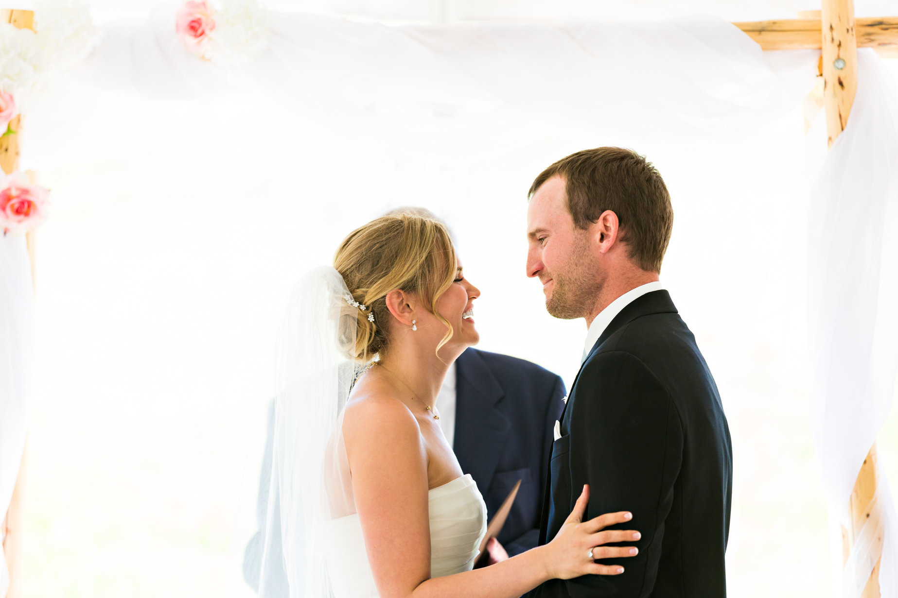 big-sky-resort-wedding-bride-groom-laughing-after-just-married.jpg