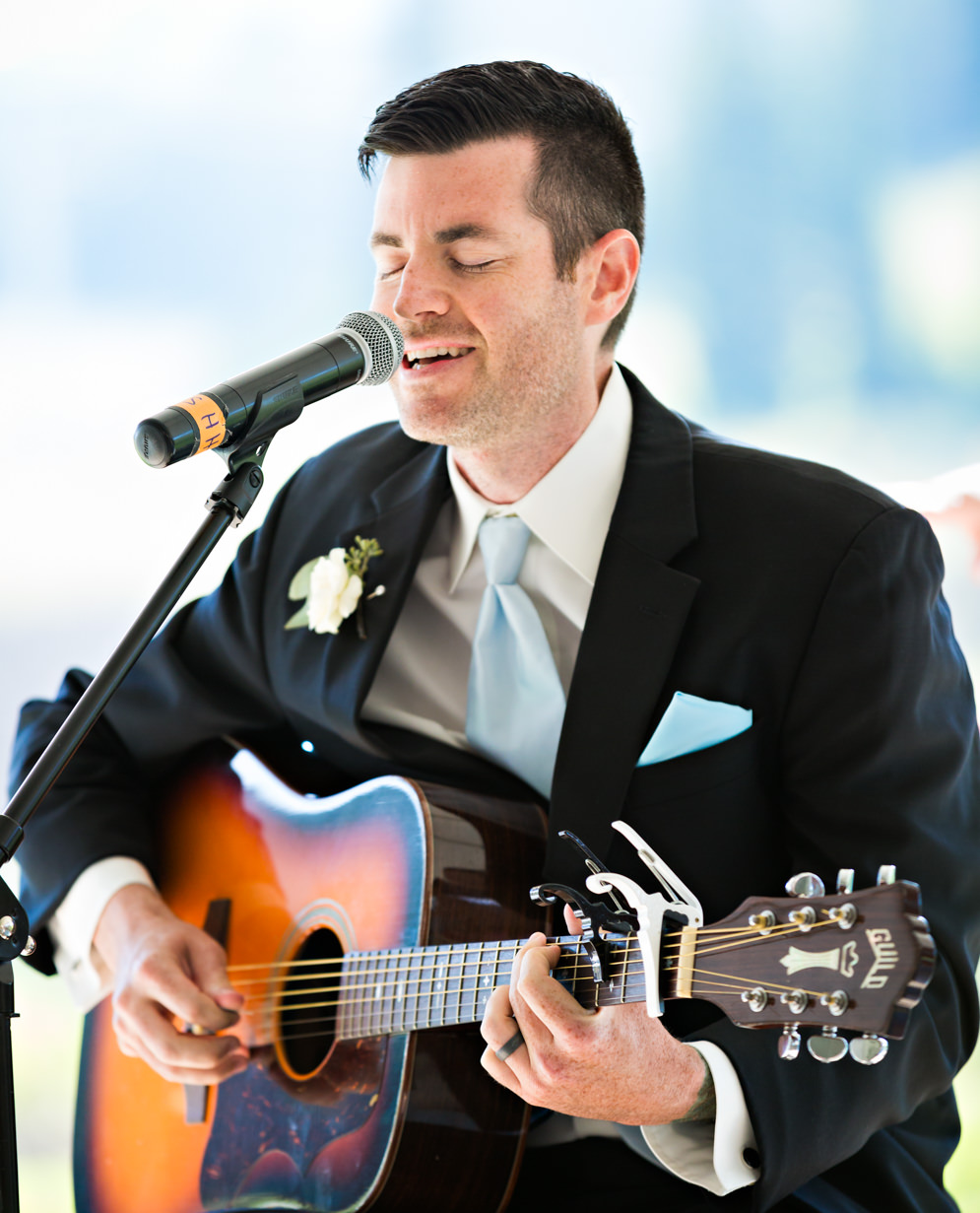 big-sky-resort-wedding-brother-sings-during-ceremony.jpg