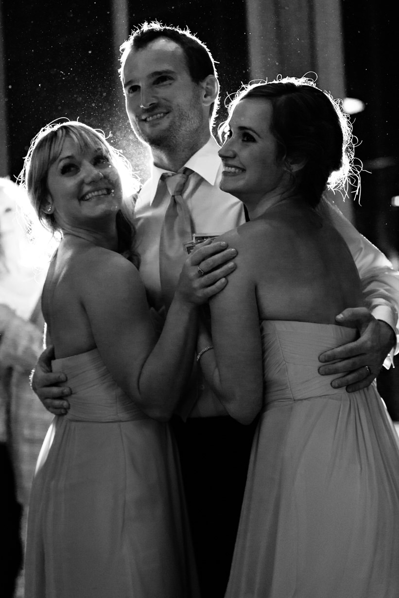 big-sky-resort-wedding-groom-dances-with-sisters.jpg