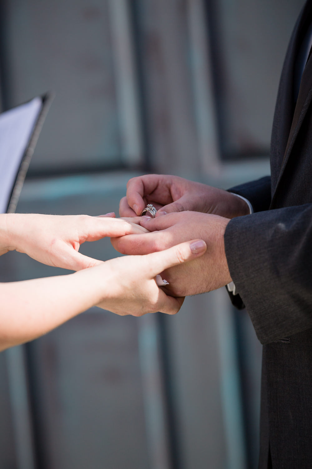 heritage-hall-missoula-montana-bride-groom-exchange-rings.jpg