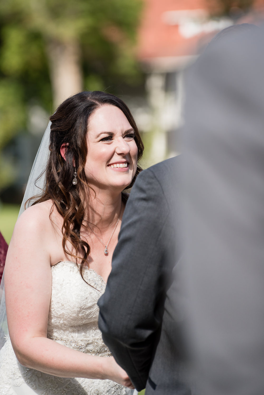 heritage-hall-missoula-montana-bride-laughing-during-ceremony.jpg