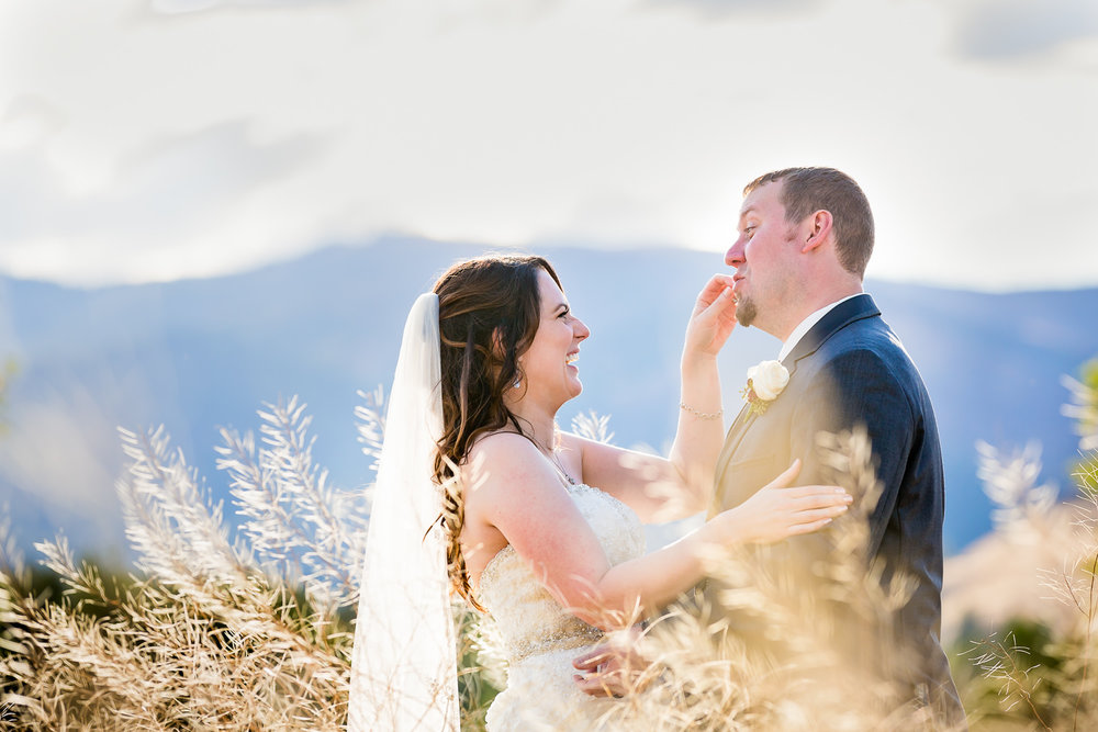 heritage-hall-missoula-montana-bride-gives-groom-moustache.jpg