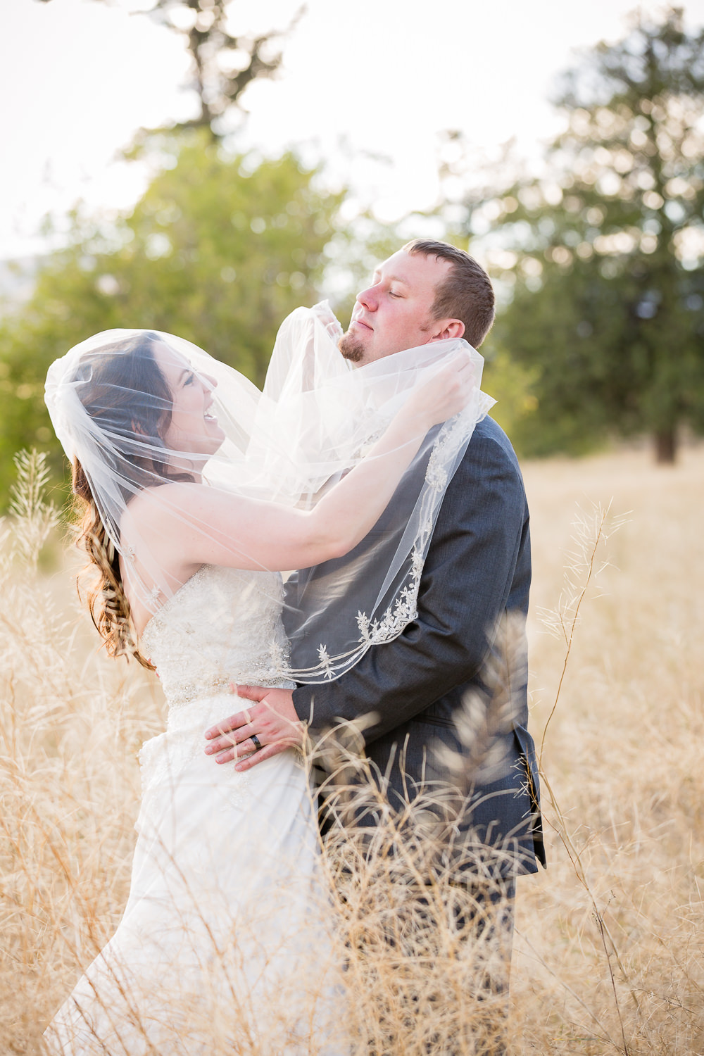 heritage-hall-missoula-montana-bride-gives-groom-veil-beard.jpg