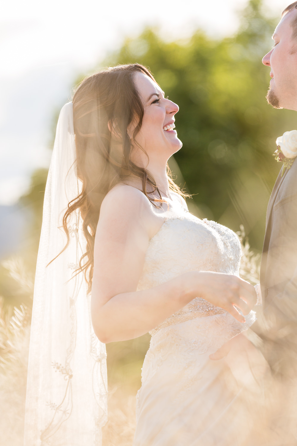 heritage-hall-missoula-montana-bride-through-tall-grasses.jpg