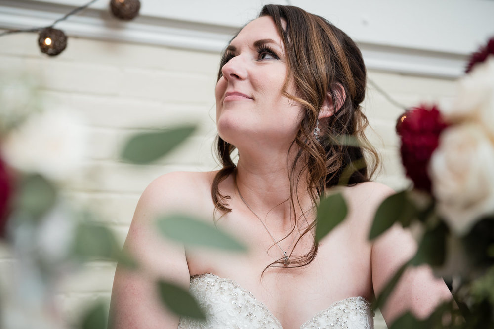 heritage-hall-missoula-montana-bride-smiles-during-toasts.jpg